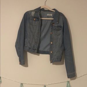 Distressed denim jacket